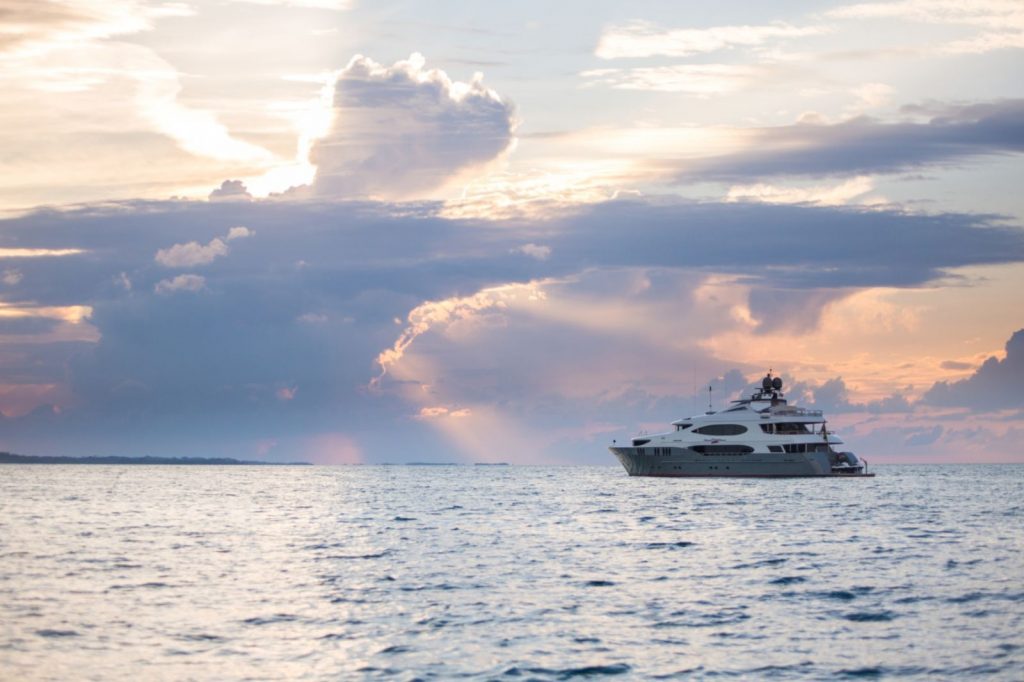 Clouds on horizon profile of ZOOM ZOOM ZOOM cruising toward sunset