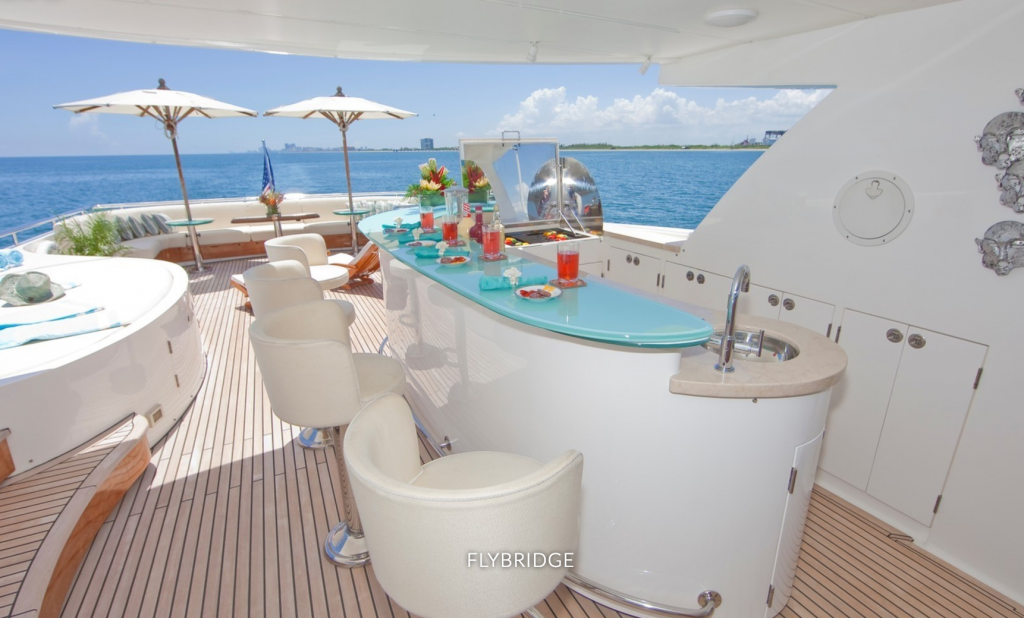 Bar and tropical cocktails on fly bridge of motor yacht DIAMOND GIRL