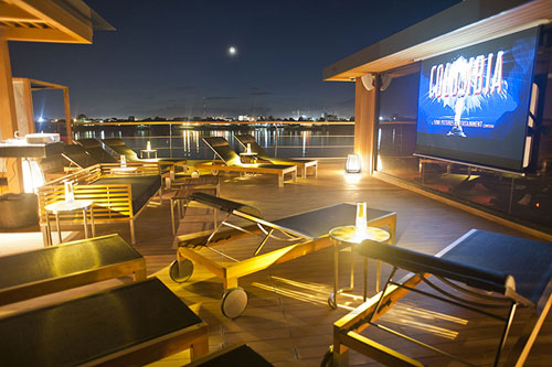 Aqua Mekong's outdoor on deck cinema at night