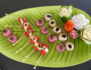 Table Scaping Winning plate by NATHALIE HUET on the 64' Power Catamaran VIGILANT 1