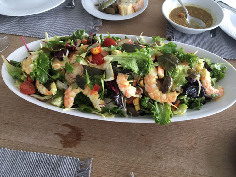 Shrimp in a green salad made by top yacht chef George on the catamaran SERENE