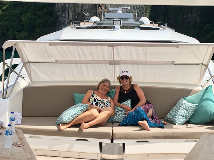 Carol and friend Louise Daley relaxing on the 108ft motor yacht DOLCE VITA in Thailand