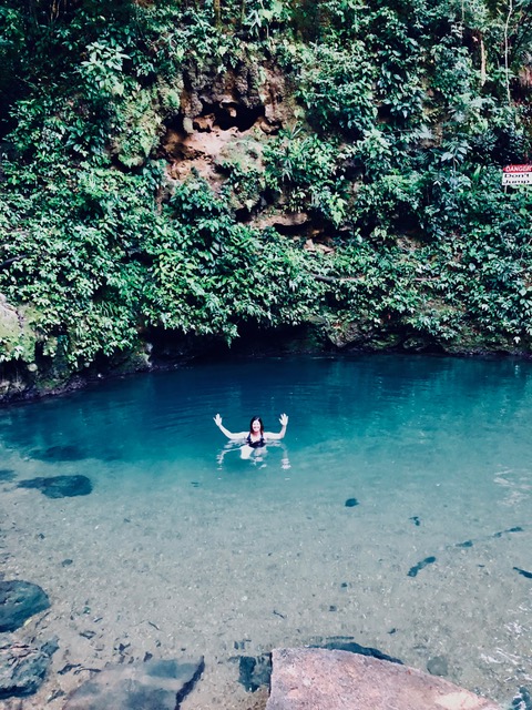 Molly luxiuriating Cayo's famous Blue Hole in Belize