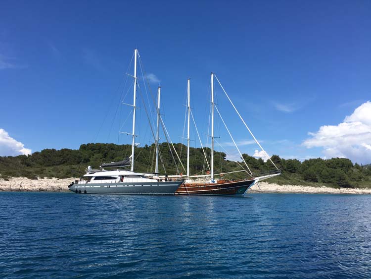 Motor sailors San LiMi and Dolce Vita at anchor in Croatia