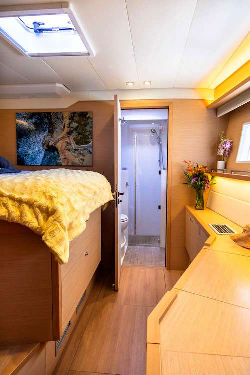 Cabin with glass shower aboard sailing catamaran TWIN FLAME