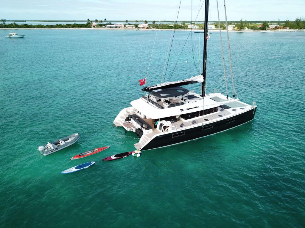 62ft Lagoon sailing catamaran MAHASATTVA with its kayaks and dinghy