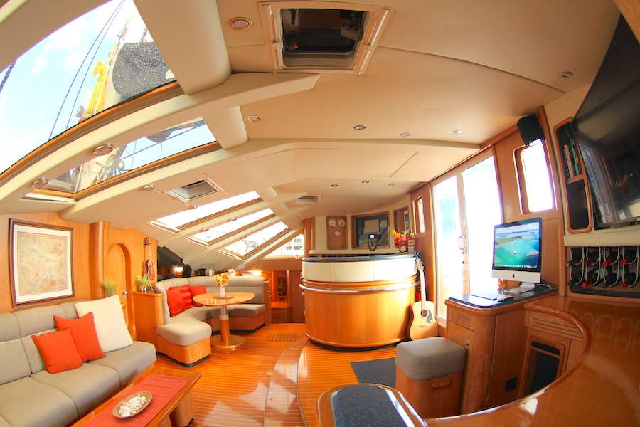 Saloon of the sailing catamaran LOLALITA with bar