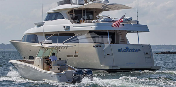 86ft custom-built SLAINTE III motor yacht seen here with its tender operates in North America and the Bahamas