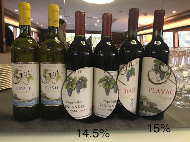 Wine bottles from Posip vineyards and Napa Valley on yacht table for a wine tasting