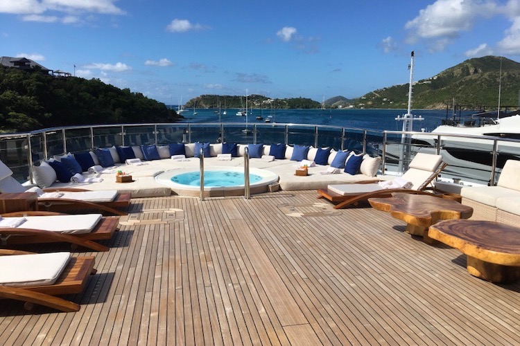 Jacuzzi and seating on yacht deck lounge in Antigua. Photo by Carol Kent