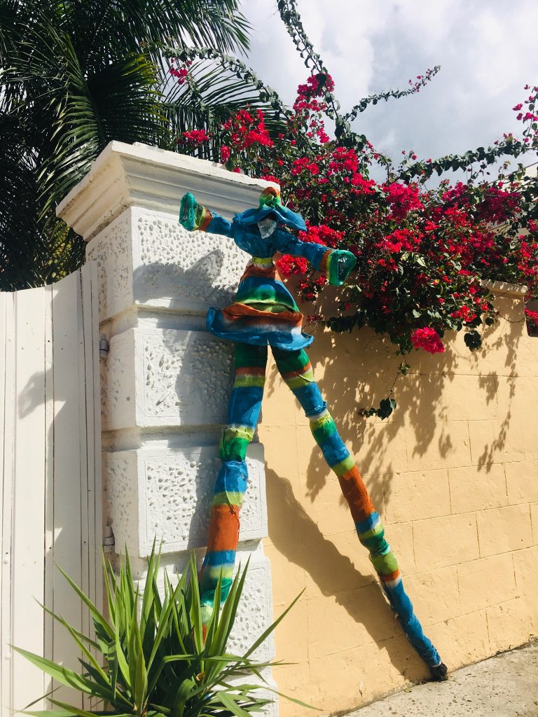 Jumbie Dancer - a dancer on stilts - in the USVI. Photo © Carol Kent