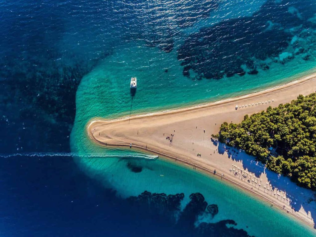 Island of Brac, Croatia, corner of sand with boats