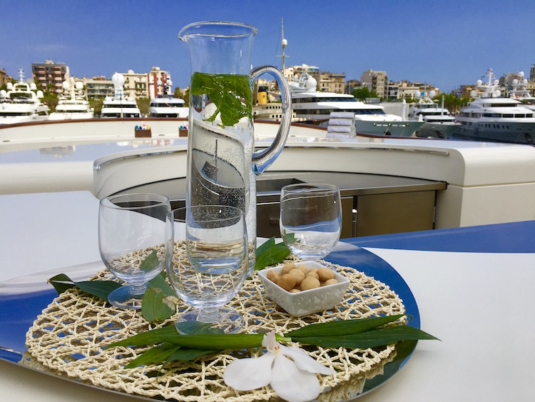 Water pitcher and glasses on tray at Port Vell Barcelona marina photo©carolkent.com