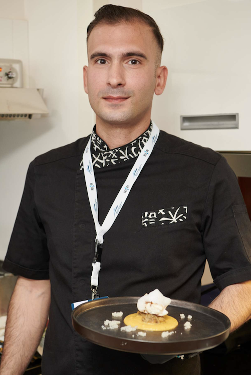 Category A | 1st Place Winner: Chef Emmanouil Perros, M/Y ZEN holding his award-winning creation at the MEDYS Chefs' Competition 2023 in Napflion, Greece