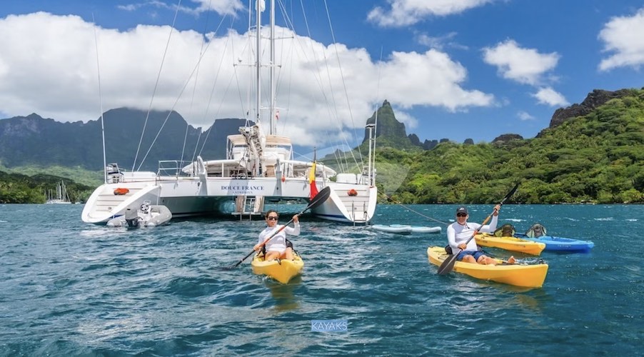 Kayaking off of 138ft Alumarine schooner sailing catamaran DOUCE FRANCE