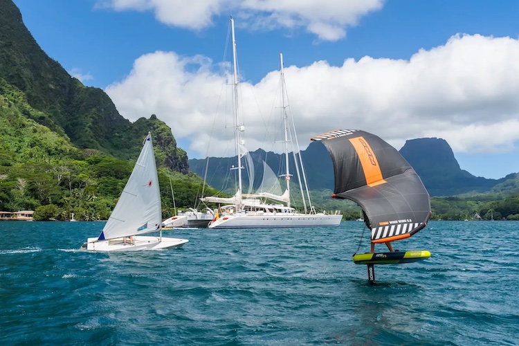 Sailboat and windsurfer off 138ft schooner sailing catamaran DOUCE FRANCE