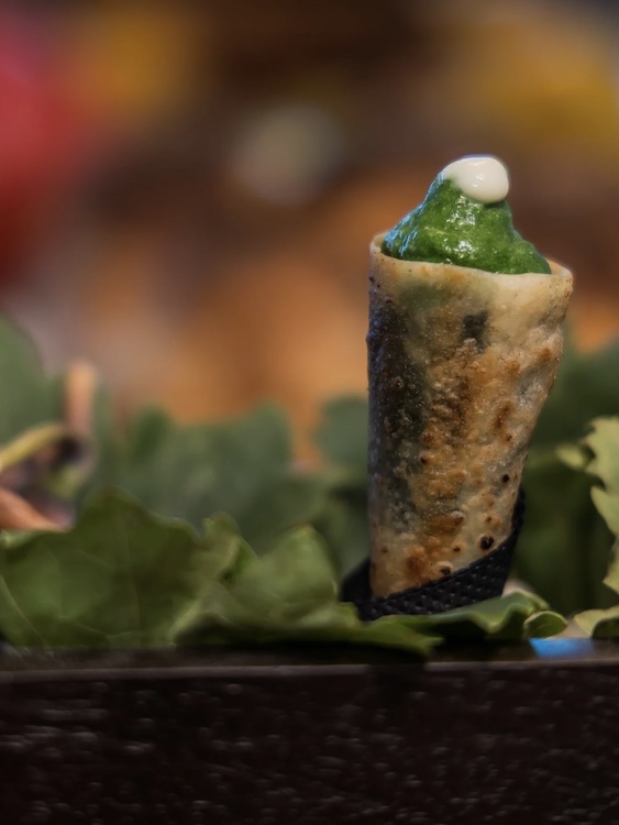 Hand-pulled pastry, sautéed Swiss chard and chard mousse, roasted garlic cream from the motor sailer yacht CORSARIO menu at the CROYA 2025 Yacht Charter Show