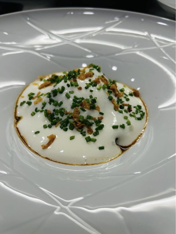 Braised veal cheeks, silky potato purée, crispy onion chips from the motor-sailer yacht CORSARIO menu at the CROYA 2025 Yacht Charter Show